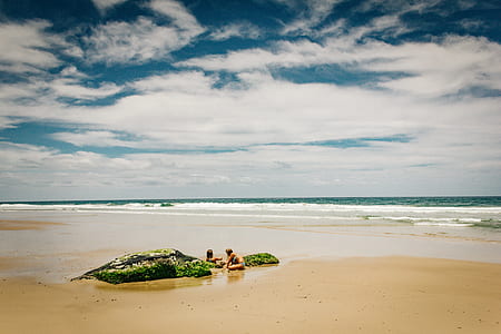two persons on the shore thumbnail