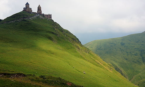 castle on top of a mountain thumbnail