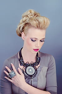 Woman With Hand on Chest thumbnail