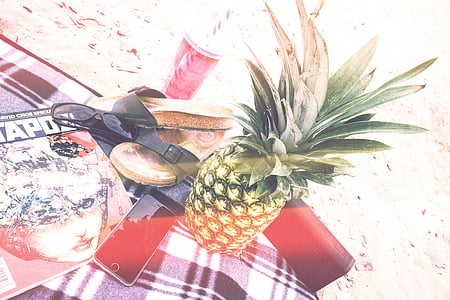 pineapple beside sandals thumbnail
