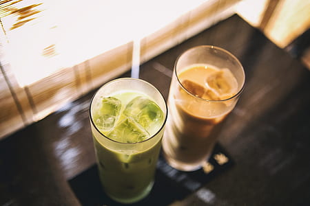 two green and brown liquid with glasses thumbnail