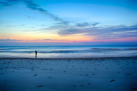 silhouette photo of person fishing thumbnail