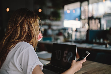 Young woman working in a cafe thumbnail