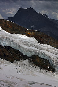 mountain coated white snow thumbnail
