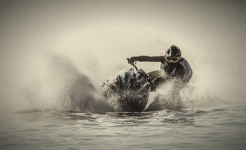 person riding on personal watercraft thumbnail