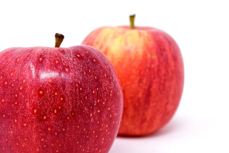 two red apples isolated on white background thumbnail