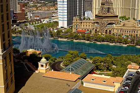 aerial photo of body of water surrounded by buildigns thumbnail