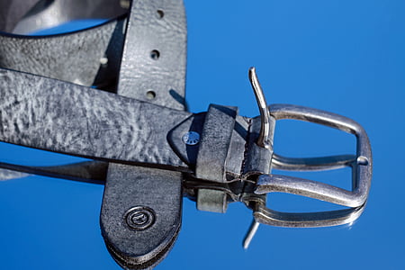 black leather belt at daytime thumbnail
