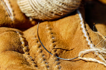 sewing needle on textile thumbnail