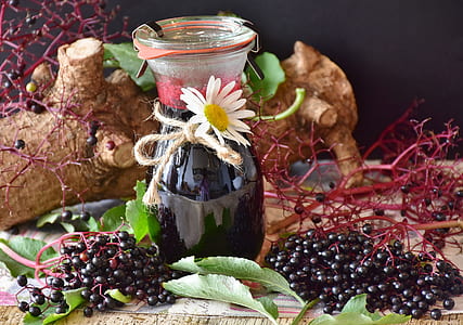clear glass carafe with bunch of grapes thumbnail