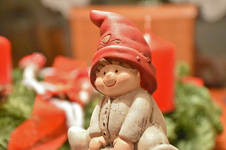 selective focus photograph of toddler figurine thumbnail