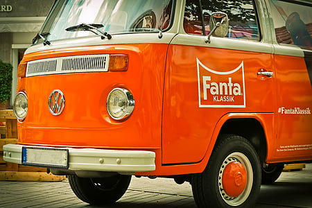 orange and white Volkswagen van thumbnail