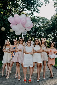 group of woman picture taking in hallway thumbnail