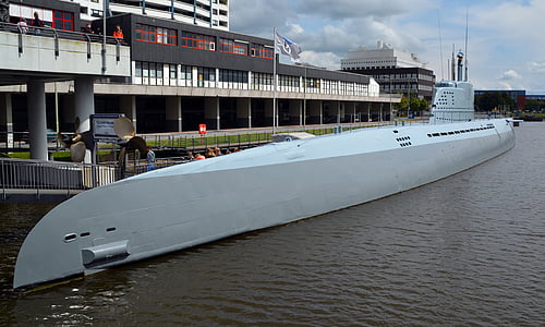 submarine beside dock thumbnail