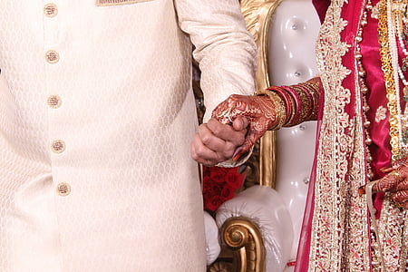 man holding hand of woman thumbnail
