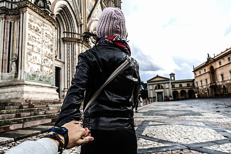 Photo of Man Holding Woman's Hand thumbnail