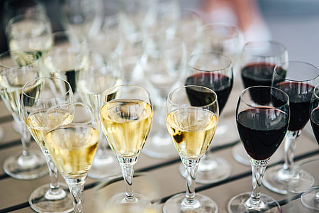 Glasses with wine and orange juice thumbnail