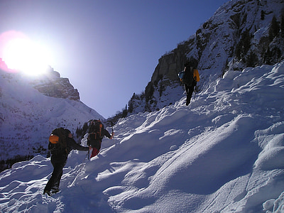 people climb on glacier mountain during daytime thumbnail