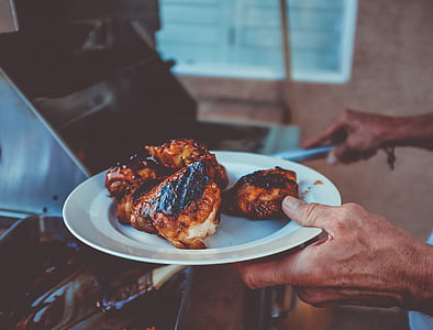 person grilling meat thumbnail
