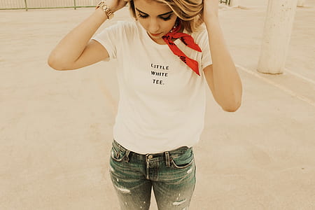 woman standing near on white post thumbnail