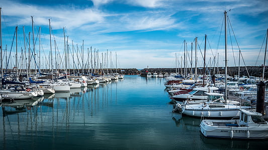 white yachts in dock thumbnail