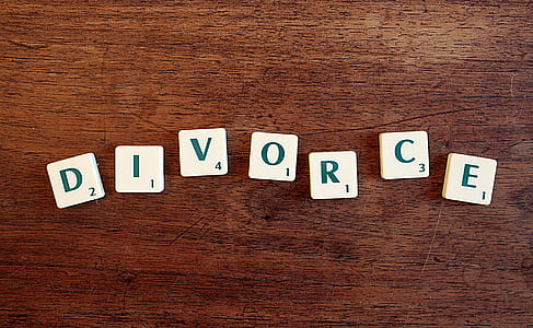 divorce text-printed scrabble tiles on brown wooden surface thumbnail