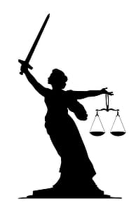 Silhouette of lady justice with raised sword. thumbnail