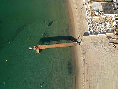 aerial photography of brown wooden dock thumbnail