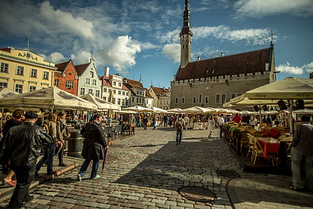 group of person walking in front of cathedral thumbnail