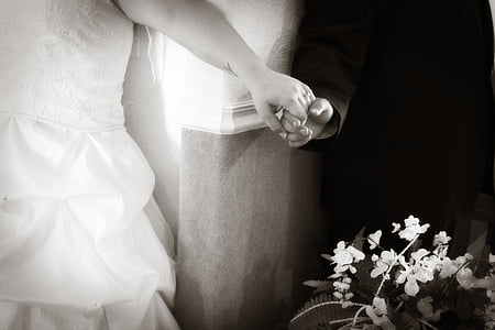 man holding women's hand thumbnail