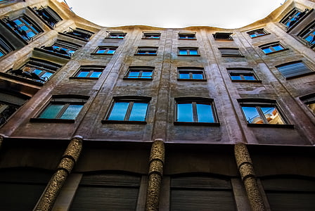 high-angle photo of brown concrete building during daytime thumbnail