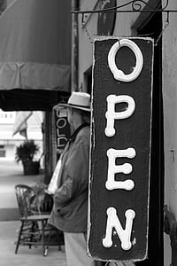 grayscale photography of open signage thumbnail