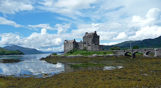 gray concrete castle near body of water thumbnail