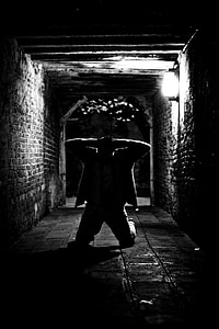 silhouette of kneeling man thumbnail