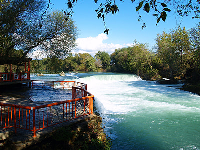 river near trees and terrace during daytime thumbnail