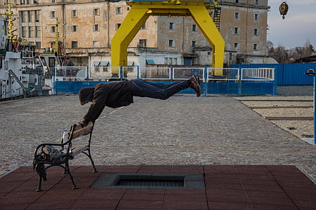 person floating holding on bench thumbnail