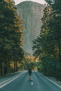 man standing in the middle of the road thumbnail