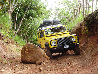 yellow wrangler blocking road thumbnail