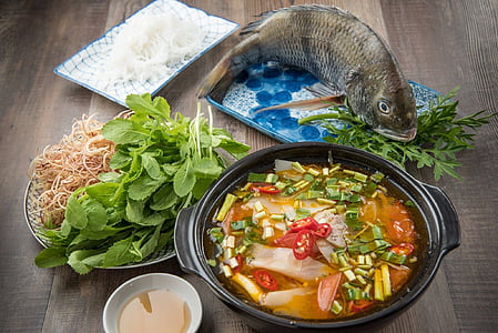 fish with vegetable and sauce dish served on casserole thumbnail