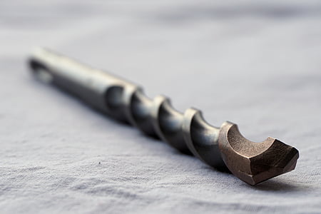 closeup photography of black drill bit thumbnail