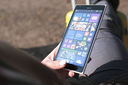 person holding Nokia smartphone thumbnail