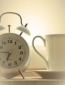 white analog alarm clock thumbnail