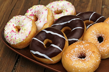 nine donuts on brown tray thumbnail
