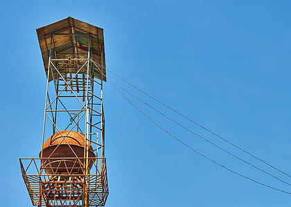 brown metal tower with tank thumbnail