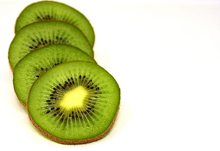 four sliced kiwi fruits thumbnail