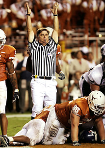 football players and umpire photo thumbnail