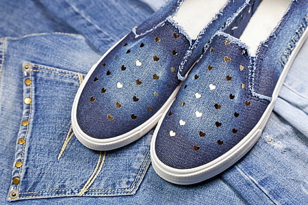 pair of white-and-blue denim slip-on shoes thumbnail
