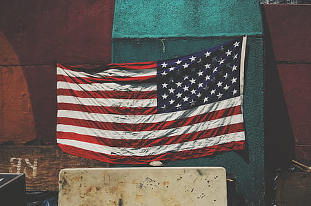 U.S.A. flag hang on green board thumbnail