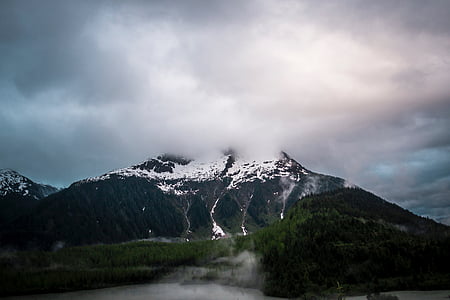 clouds over black mountain thumbnail