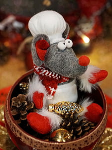 selective focus photo of rat plush toy inside of vase thumbnail